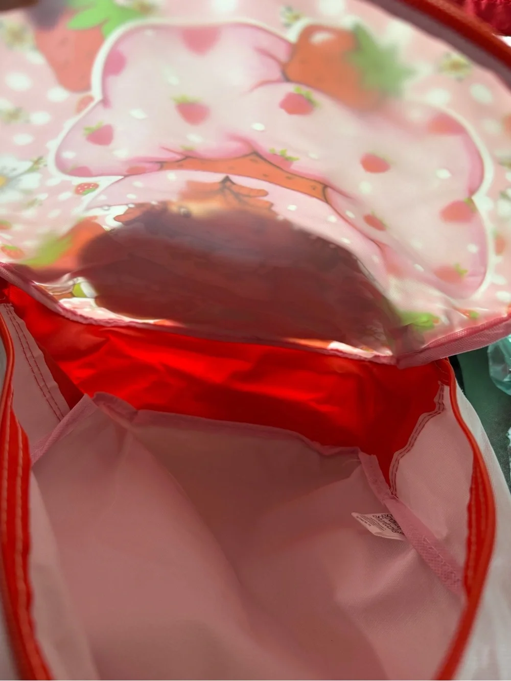 Pink Strawberry Kids Backpack with Lunchbox and a strawberry wireless speaker